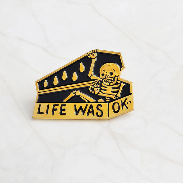 Skull head brooch