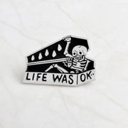 Skull head brooch