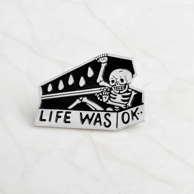 Skull head brooch