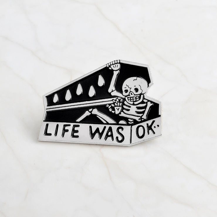 Skull head brooch