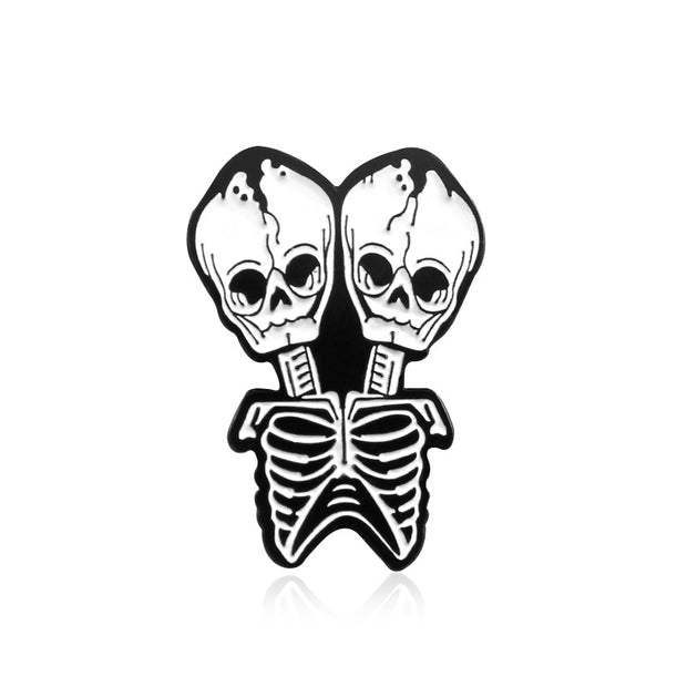 Conjoined skull Brooch